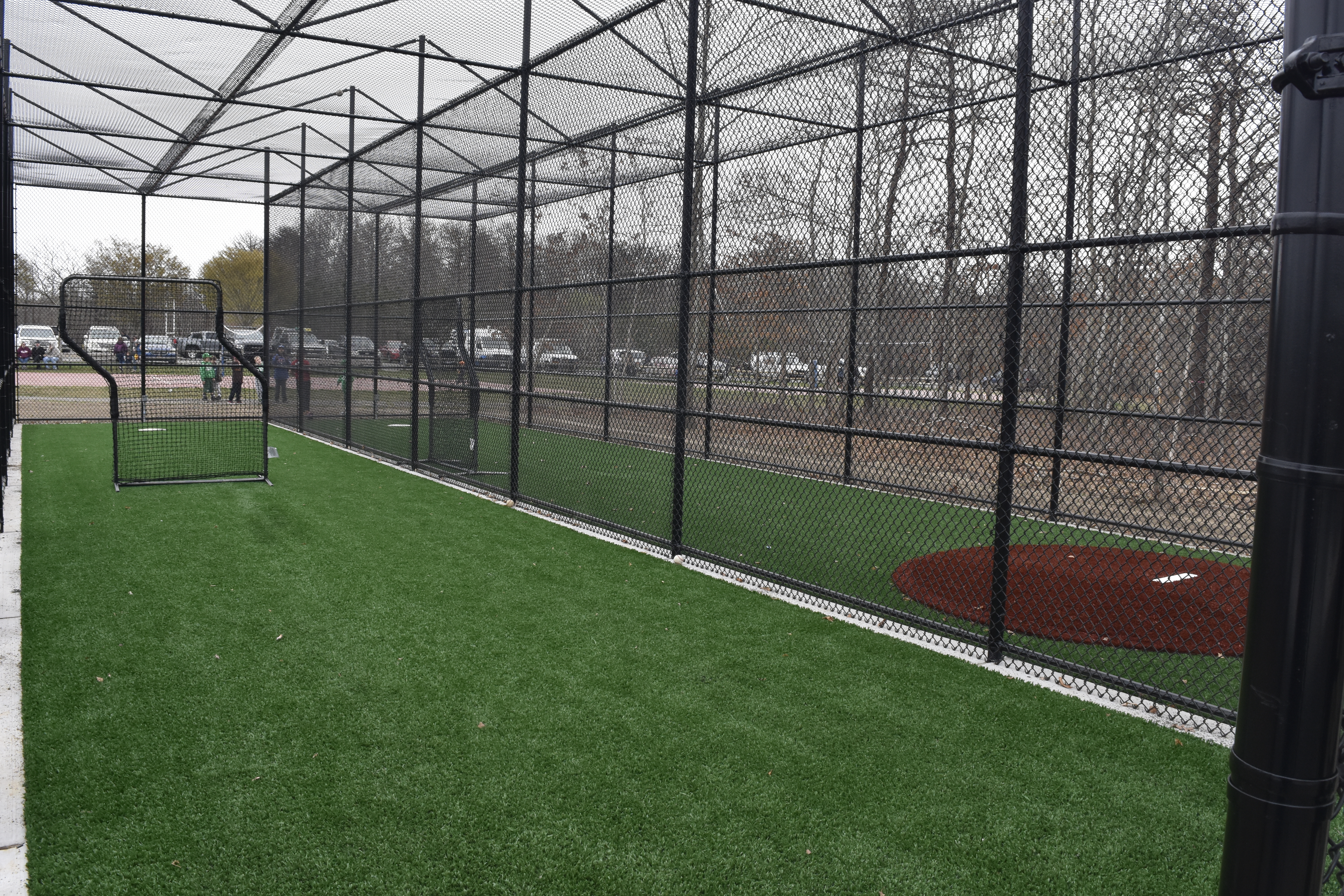 The facility includes a pair of permanent batting cages.   DREW BUDD