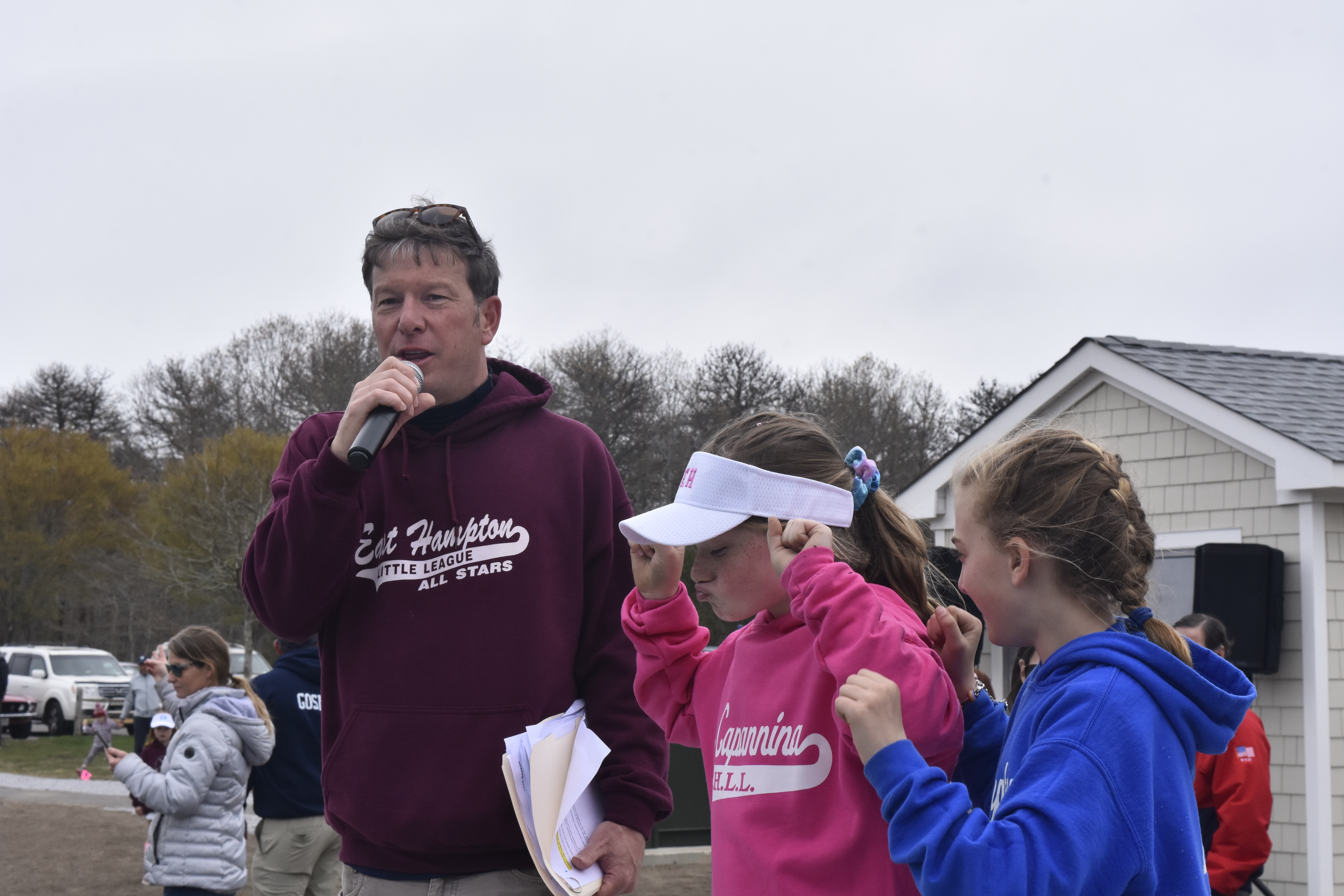 East Hampton Little League board member Jeff Tupper starts Opening Day.   DREW BUDD