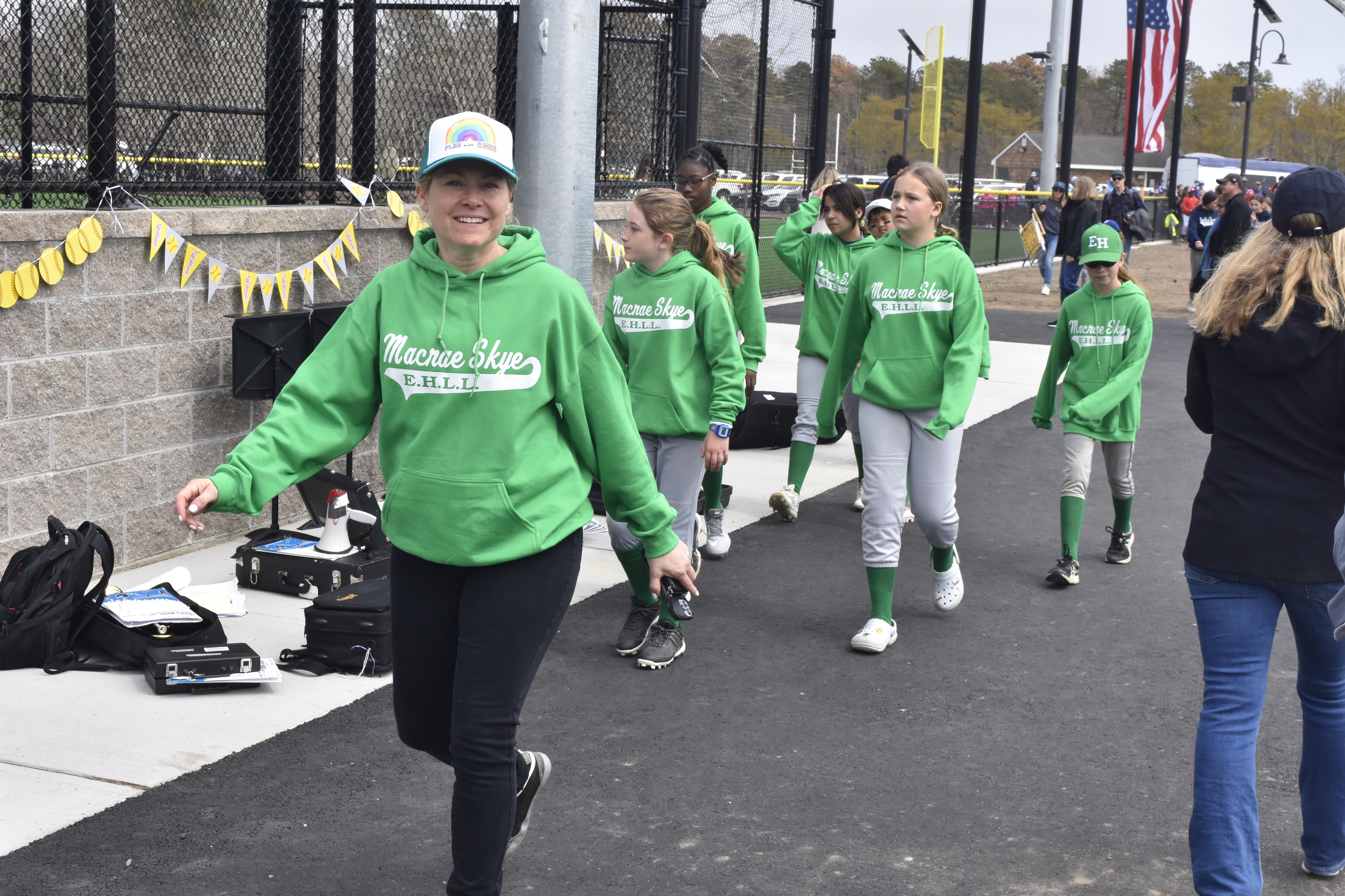 East Hampton Little League's Opening Day parade begins as all of its teams head out onto the field.   DREW BUDD