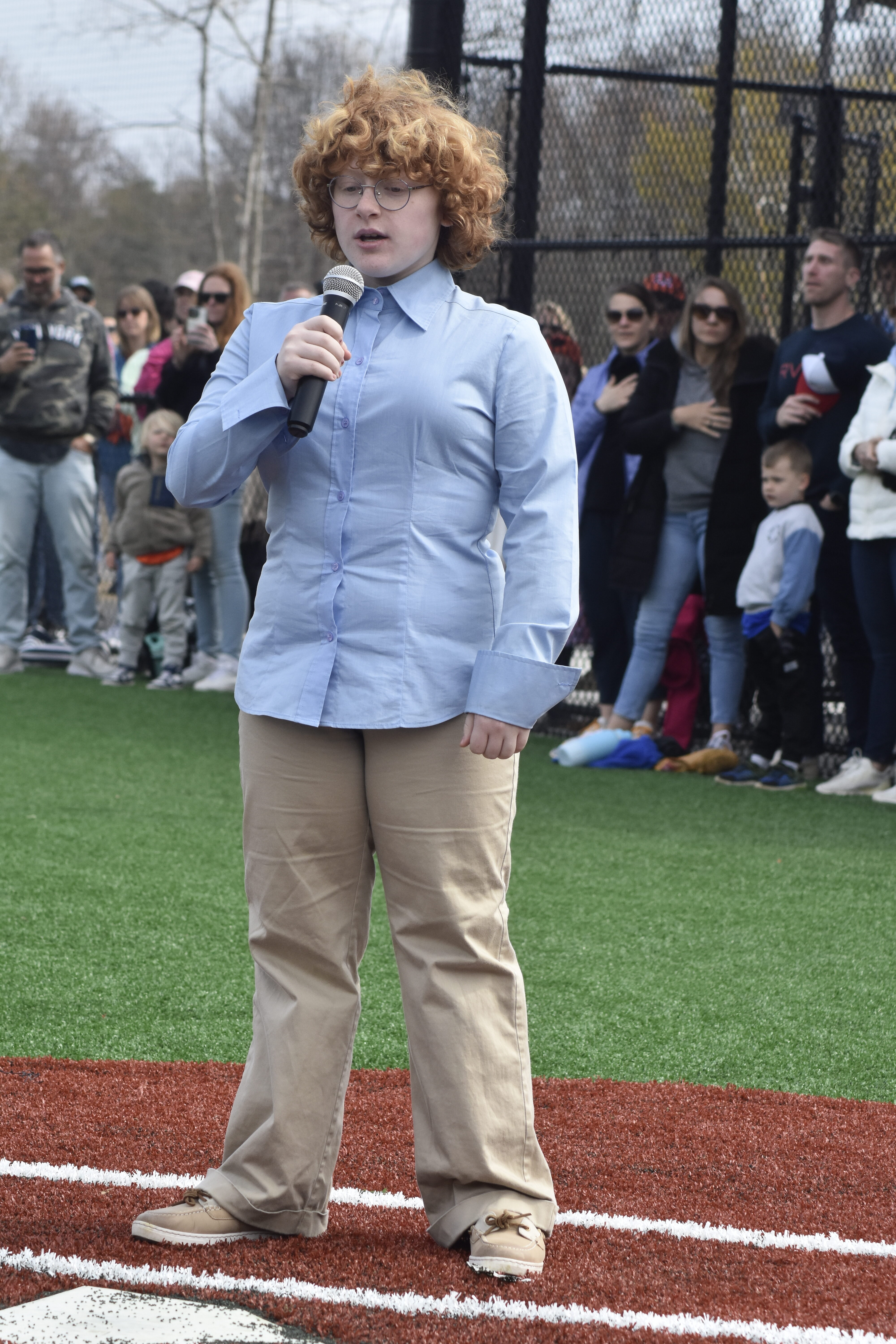 Mulcahey? perofrms the National Anthem.   DREW BUDD