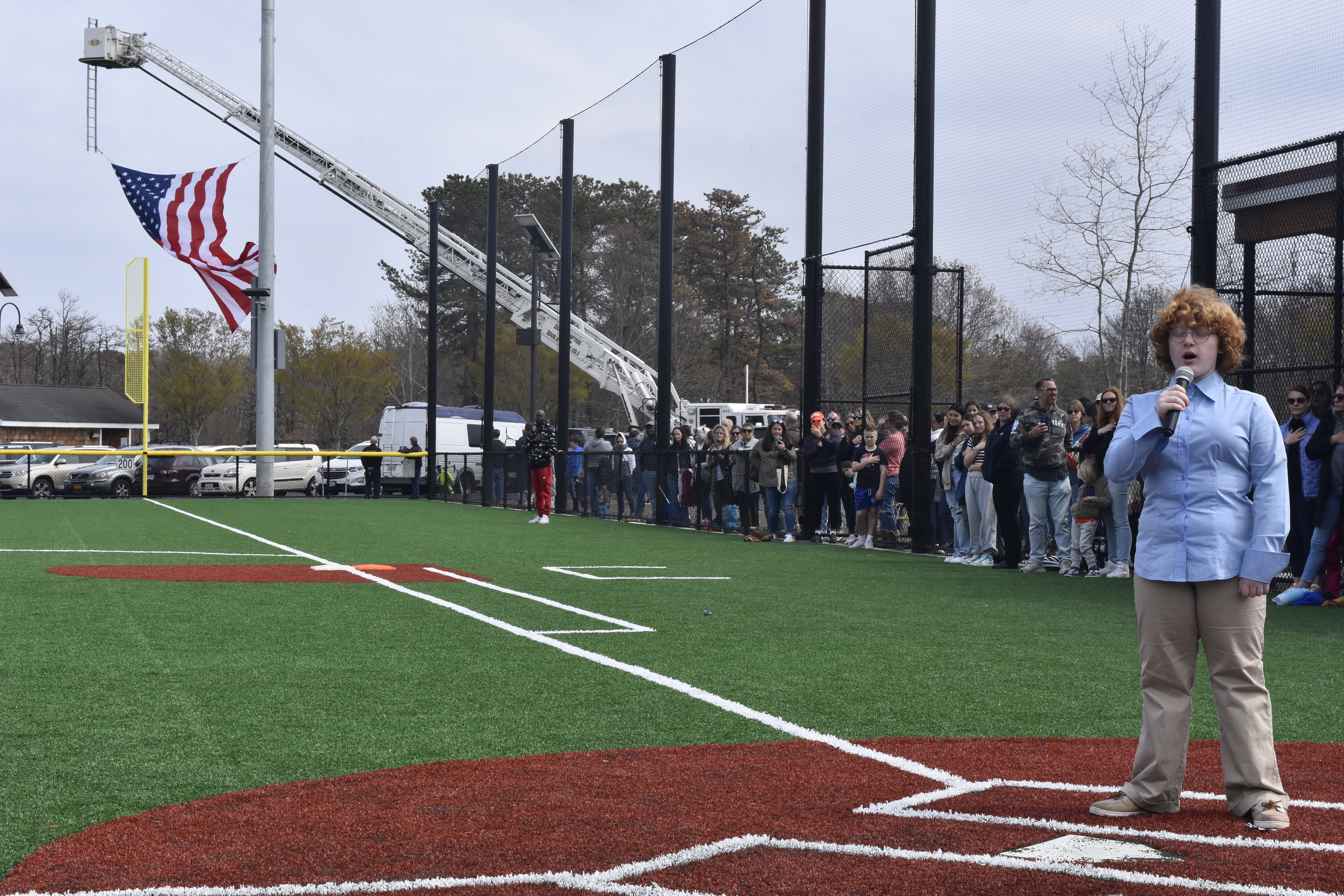 Faith Mullaly of Montauk performs the National Anthem.   DREW BUDD