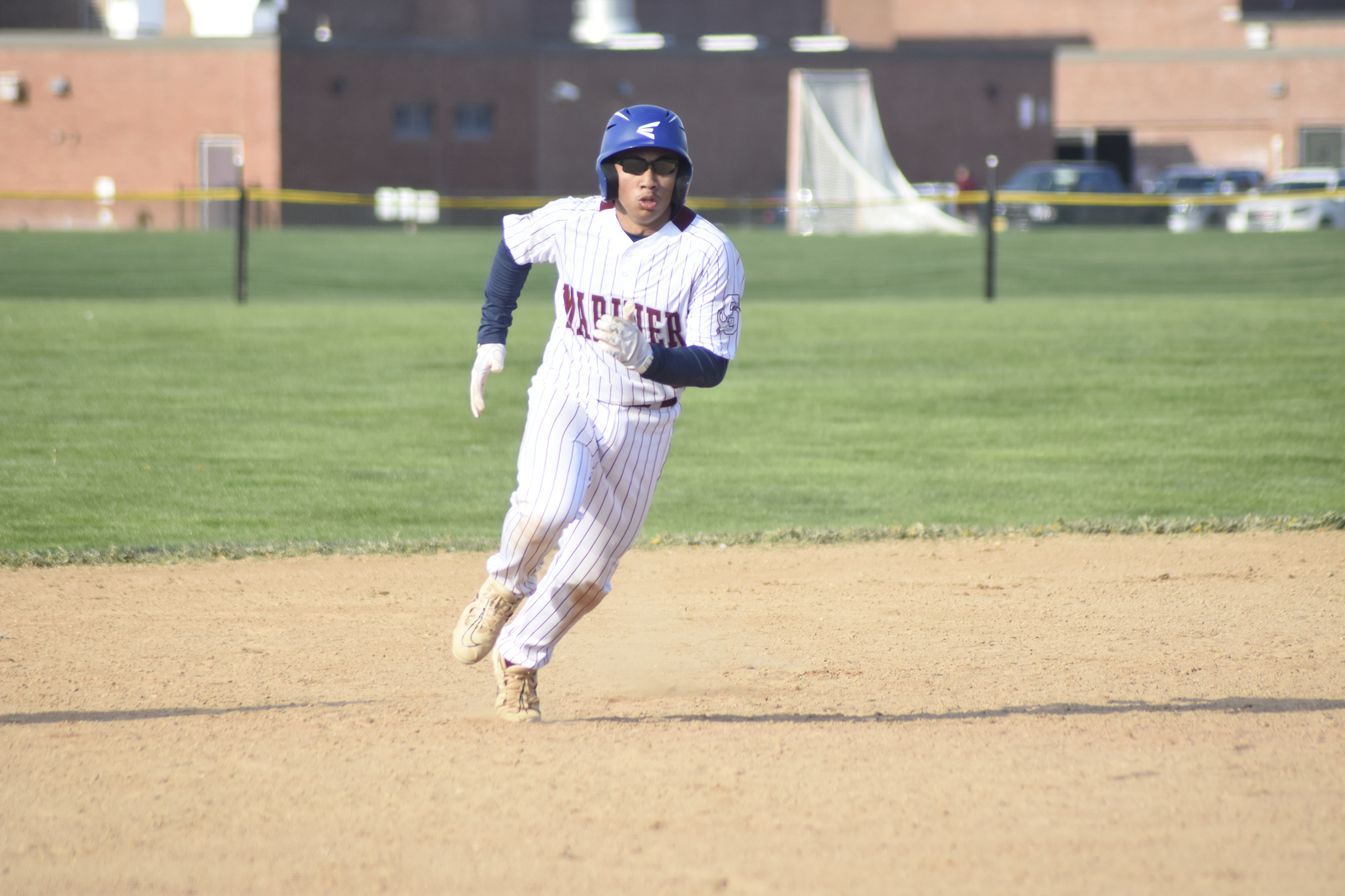 Mariner Elijah Abella heads for third.   DREW BUDD