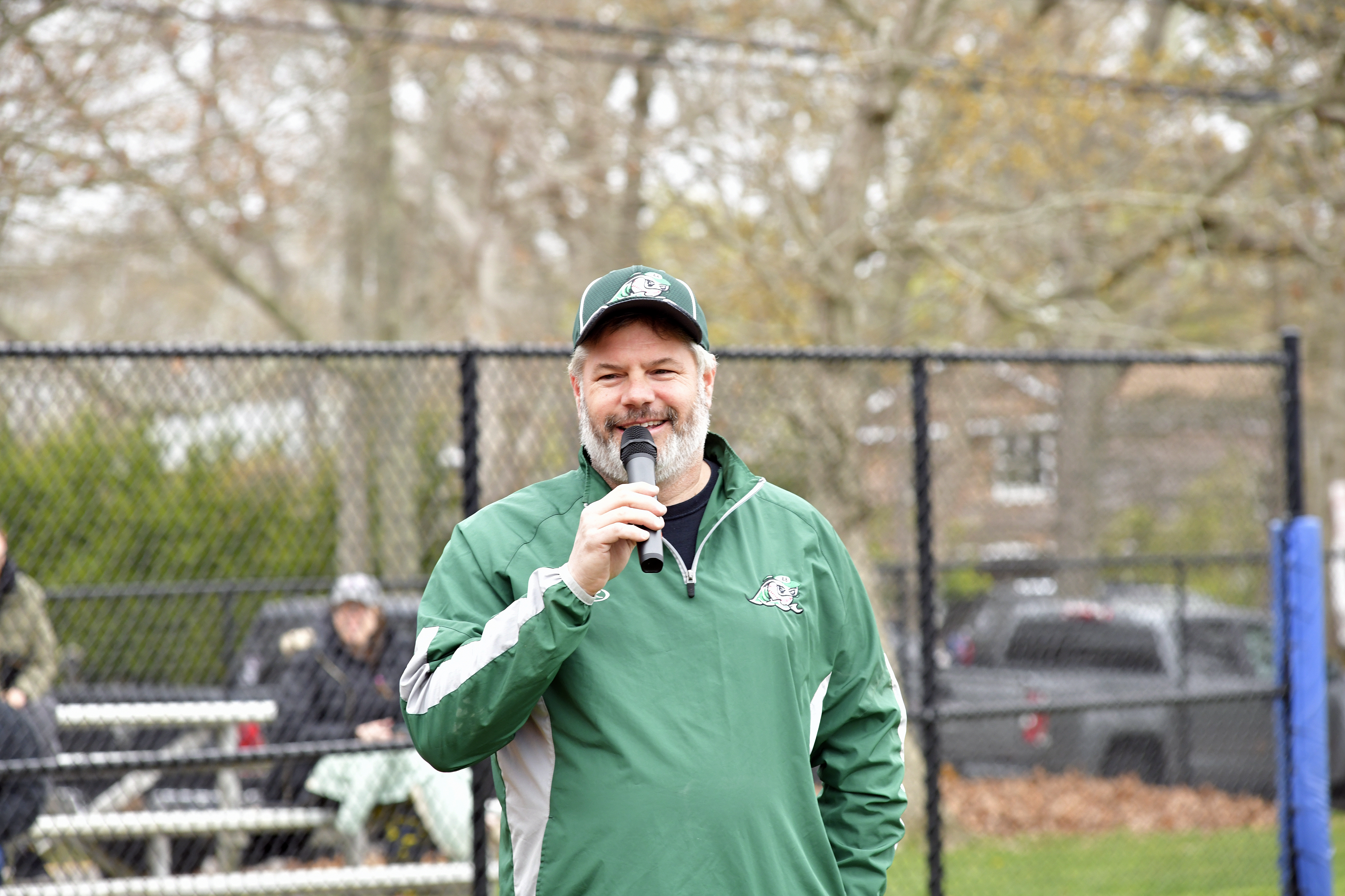 Bill Dawson, East End Little League president, welcomes the crowd.