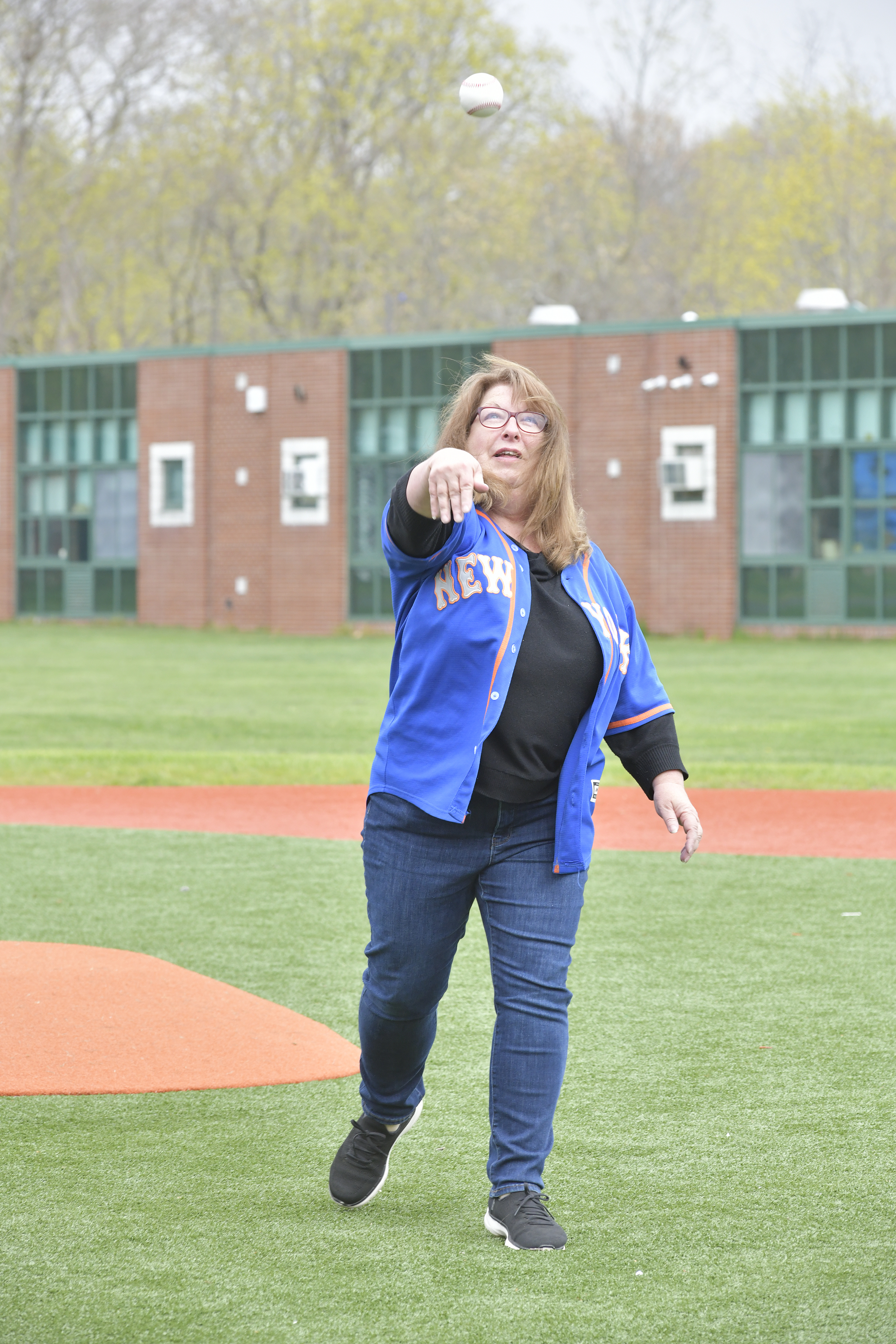 Dawn Long throws out the first pitch.
