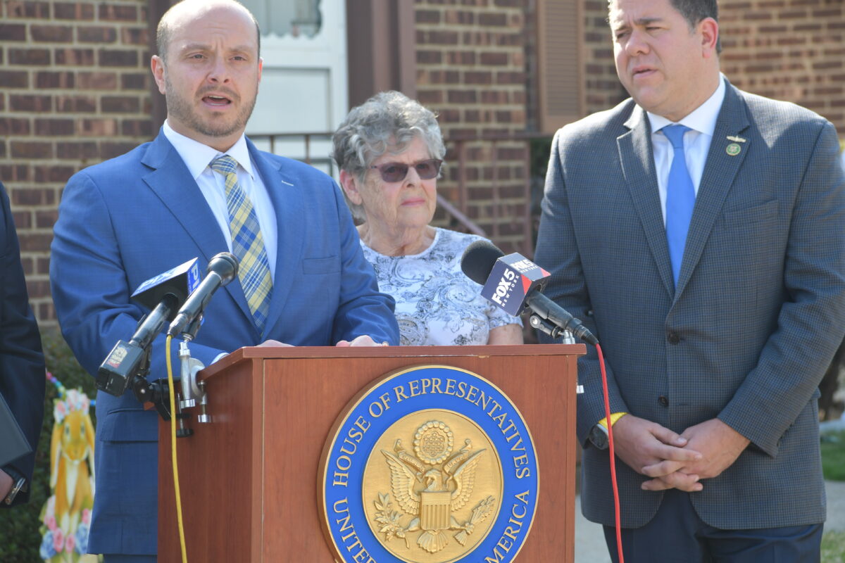 U.S. Representatives Andrew Garbarino and Nick LaLota with a Franklin Square resident and taxpayer who lent her driveway as a venue for the announcement of new legislation to repeal the SALT deduction cap.  COURTESY OFFICE OF CONGRESSMAN ANDREW GARBARINO COURTESY OFFICE OF CONGRESSMAN ANDREW GARBARINO
