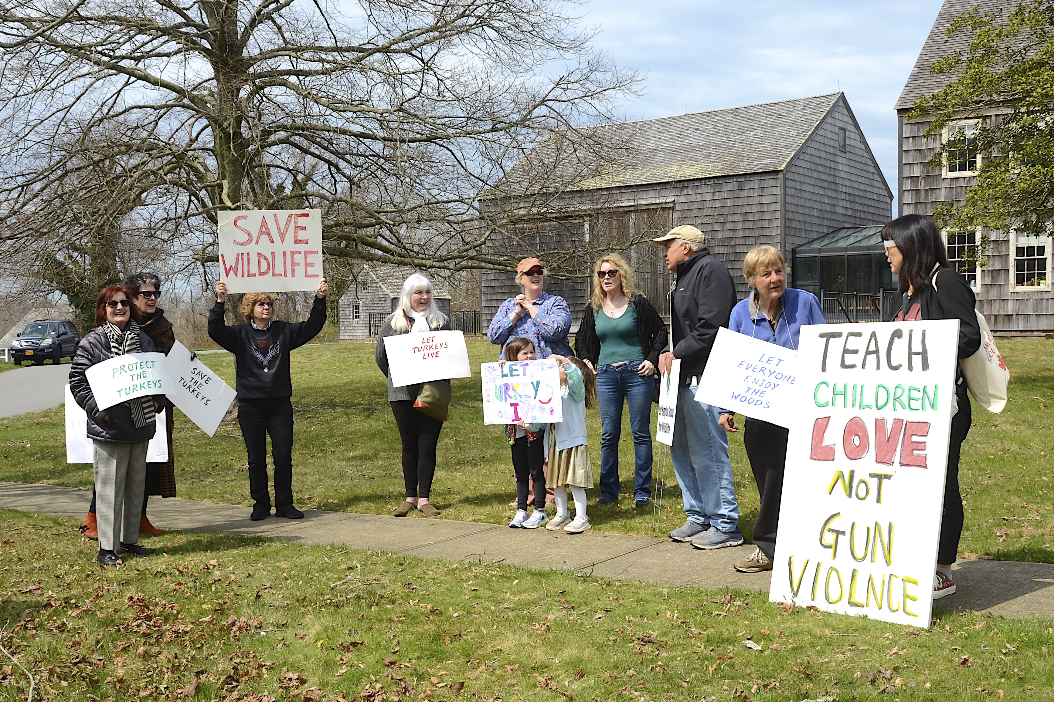 The demonstration hosted by the East Hampton Group for Wildlife opposing the addition of a turkey hunting season in May was held in front of Town Hall prior to the meeting on April 6.  KYRIL BROMLEY