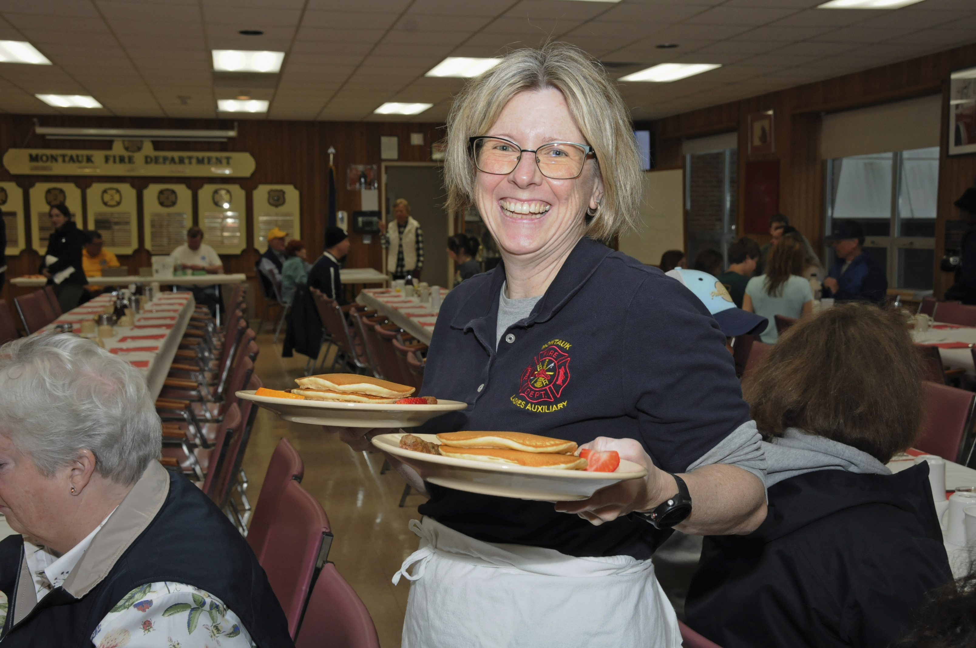 Dawn Lucas at the Montauk Point Lions Club and the Montauk Fire Department's combined pancake breakfast on Sunday at the firehouse.   RICHARD LEWIN