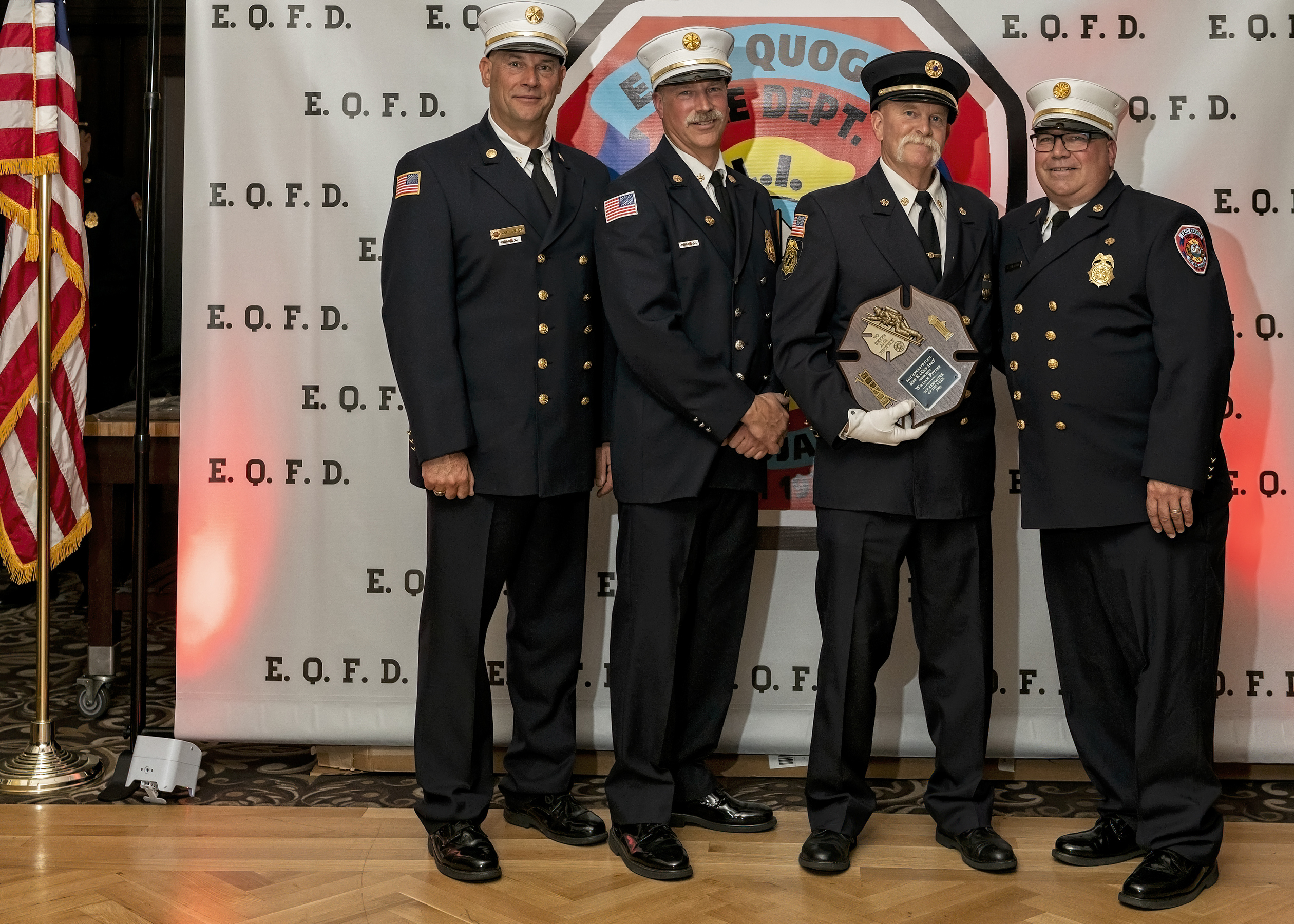 The East Quogue Fire Department presented the Scotty Oliver Top Responder Award to Ex-chief Bill Potter, third from left, at the department’s installation dinner held at the Long Island Aquarium on Saturday. Shown with Ex-chief Potter are, from left, Third Assistant Chief Mark Gregory, Second Assistant Chief Glenn Bullock, and Chief Paul Sulzinski. COURTESY EAST QUOGUE FIRE DEAPRTMENT