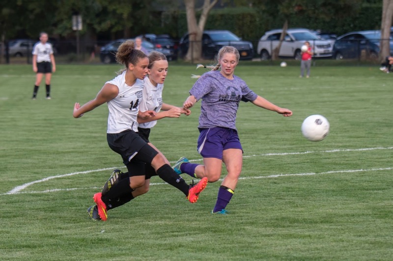 Pierson's Chastin Giles shoots and scores as the Lady Whalers faced Port Jefferson as part of homecoming on Friday.