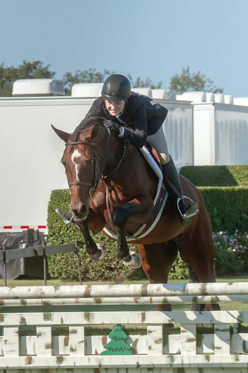 Sag Harbor's Isabel Culver takes her mount Cabaret over a jump during a Local Junior Hunter Class competition on Sunday. Michael Heller photo