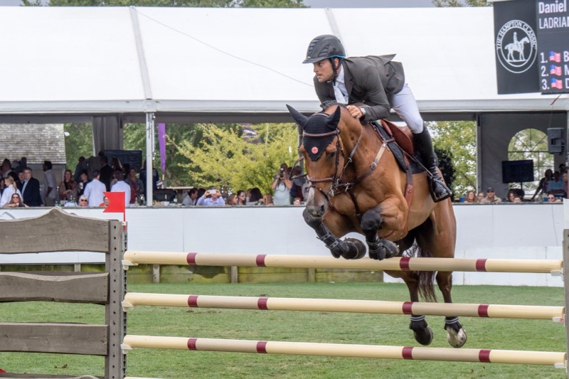 Daniel Bluman clears a jump on his mount Ladriano Z during the 2017 Hampton Classic Grand Prix Sunday. Michael Heller photos