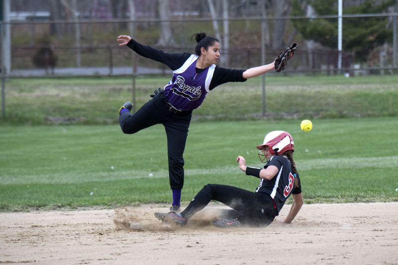 Pierson's Isabella DiRussa slides safely into second base against Port Jefferson on Monday. Michael Heller photos