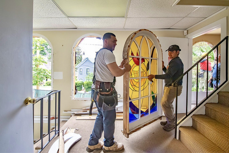 Temple windows being removed during a renovation. MICHAEL HELLER