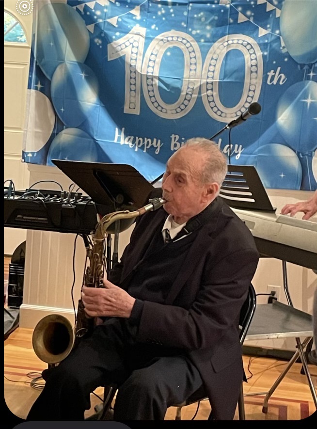 Pat DeRosa playing the saxophone at his 100th birthday.