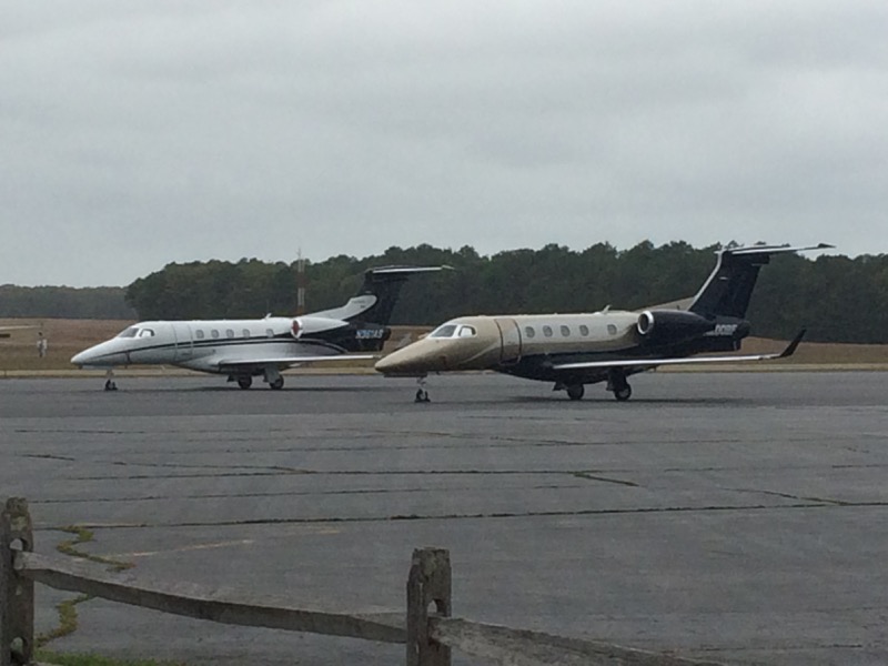 A pair of jets on the tarmac at East Hampton Airport. Stephen J. Kotz photo