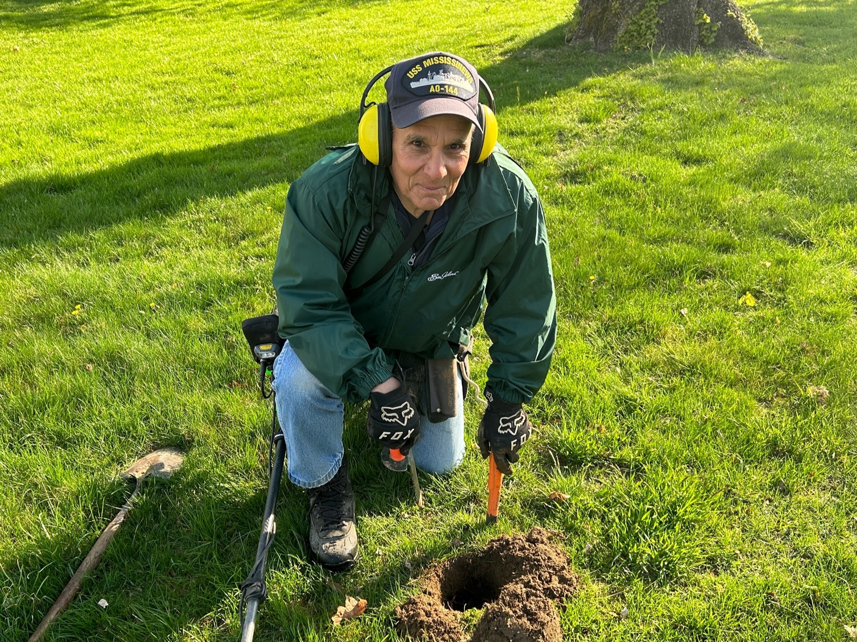 Searching for hidden treasure at area beaches is like Christmas every day, said Larry Andria. He brought his metal detector, skill, and enthusiasm to the Remsenburg Academy this week.    KITTY MERRILL