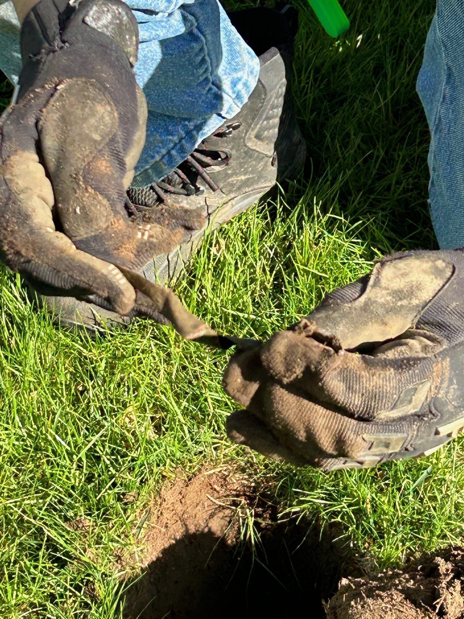 A piece of copper was part of the day's proceeds during a dig for artifacts at Remsenburg Academy.   KITTY MERRILL