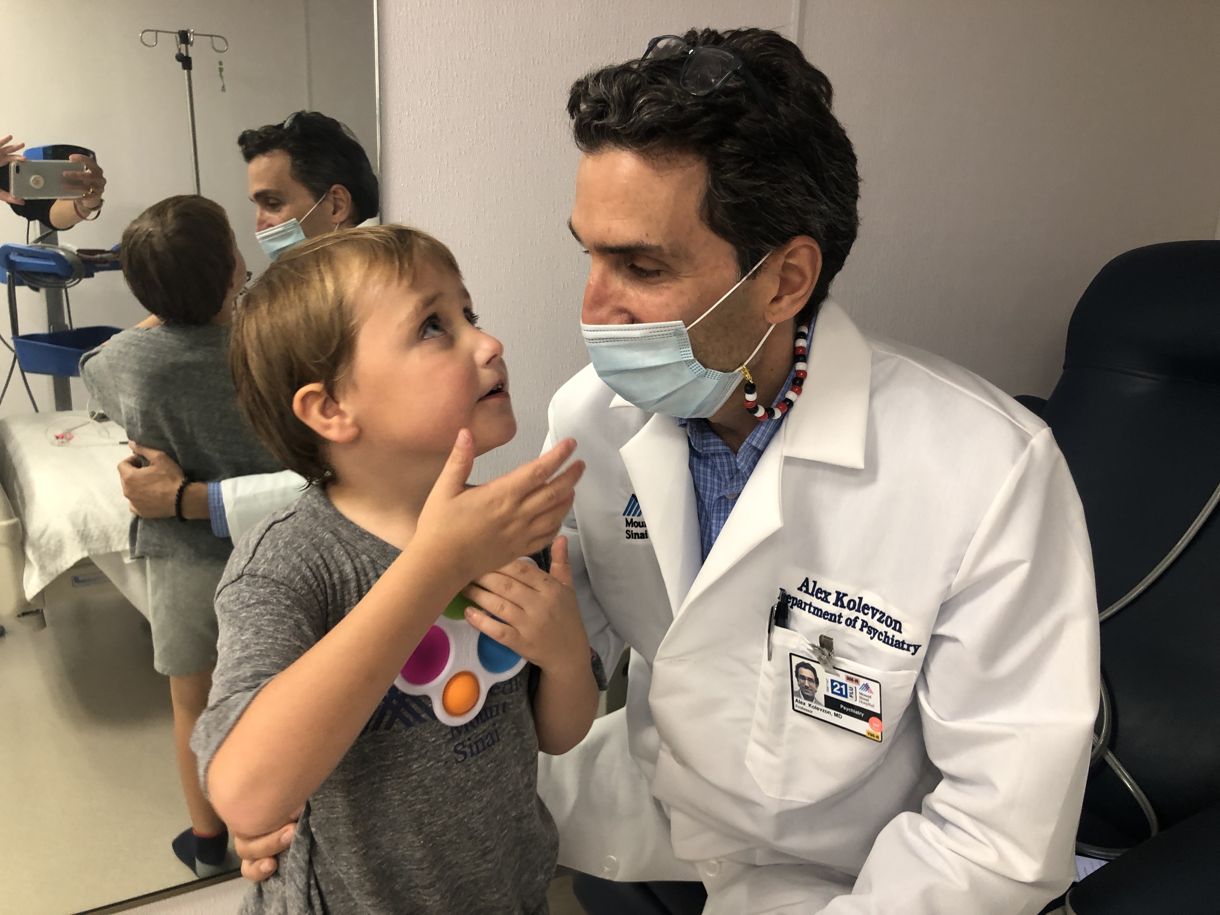 Rowland Egerton-Warburton, left, participated in a small trial in 2020 led by Dr. Alexander Kolvezon, right, that used ketamine to treat his rare genetic disorder, ADNP. COURTESY GENIE EGERTON-WARBURTON