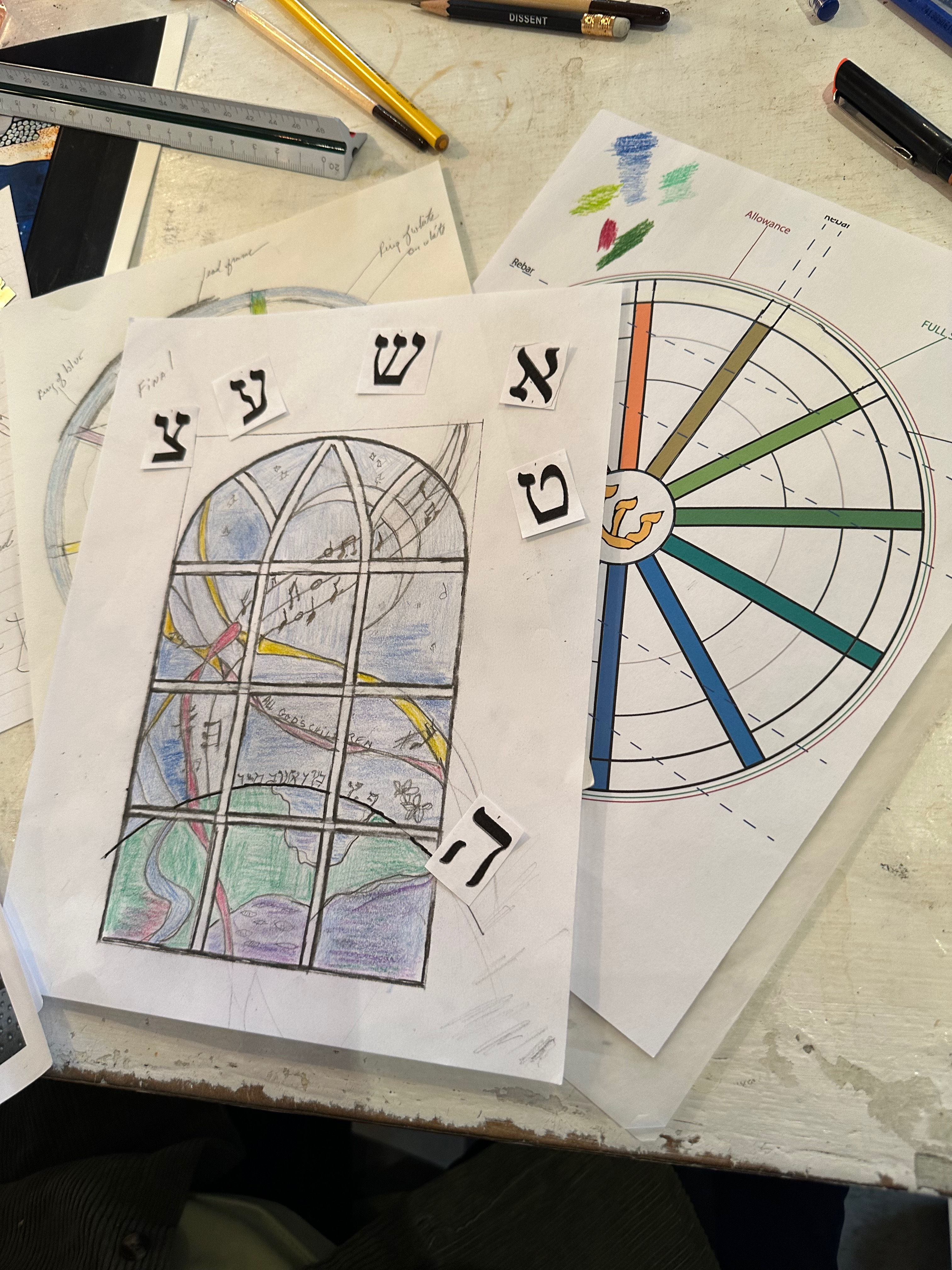 Romany Kramoris at work on a new stained glass window design for Temple Adas Israel. ANNETTE HINKLE