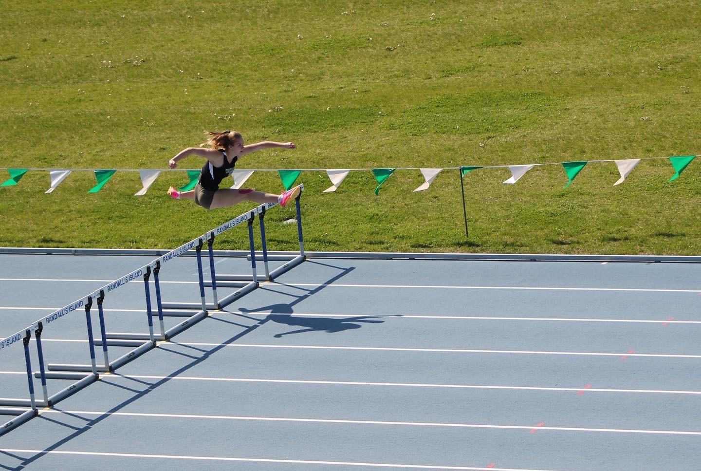 Madison Phillips competing in the 100-meter hurdles as part of the heptathlon.