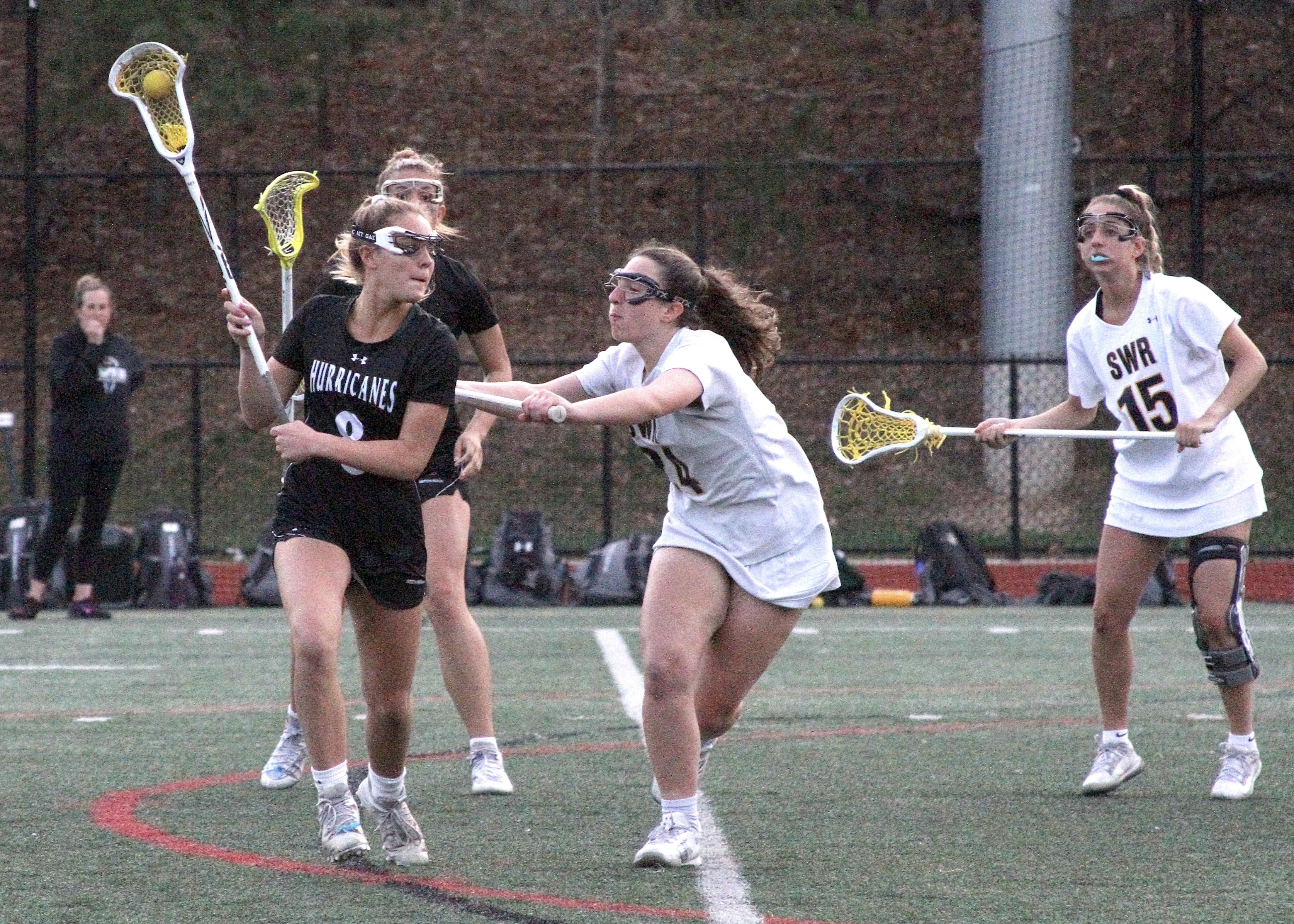 Freshman attack Ava Derby pushes her way into Shoreham-Wading River's zone. DESIRÉE KEEGAN