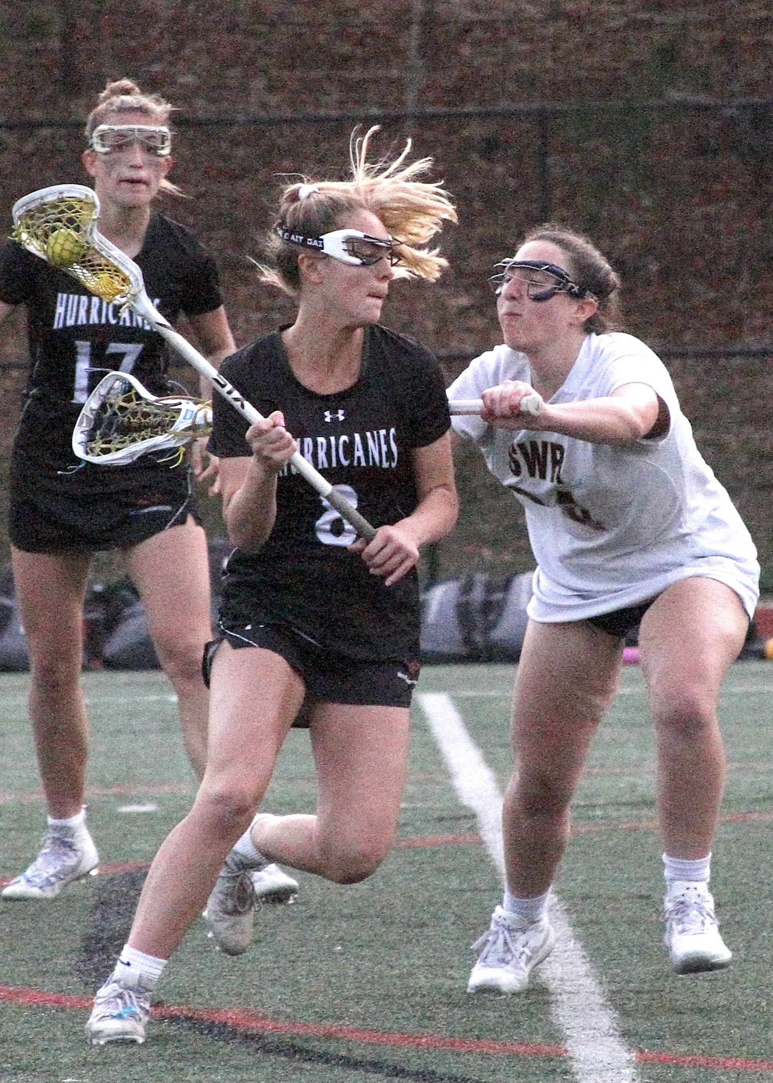 Freshman attack Ava Derby charges past a Shoreham-Wading River defender. DESIRÉE KEEGAN