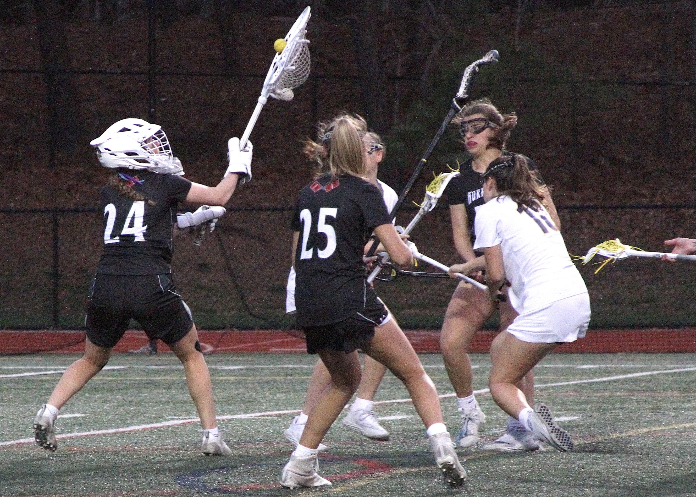 Sophomore goalkeeper Maya Farnan corrals the ball after making a sstop. DESIRÉE KEEGAN