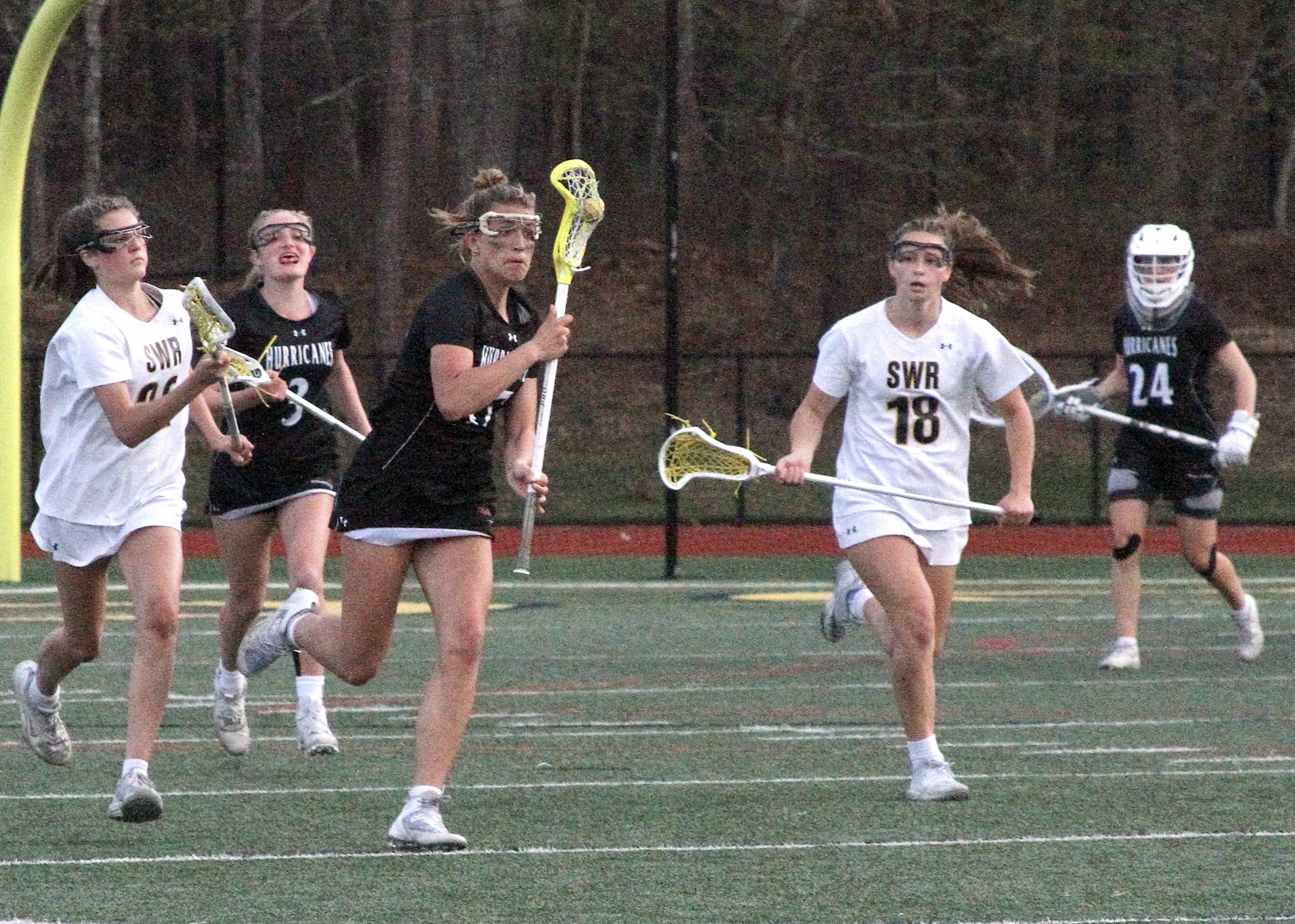 Sophomore midfielder Reese King charges ahead of the pack and up the field. DESIRÉE KEEGAN