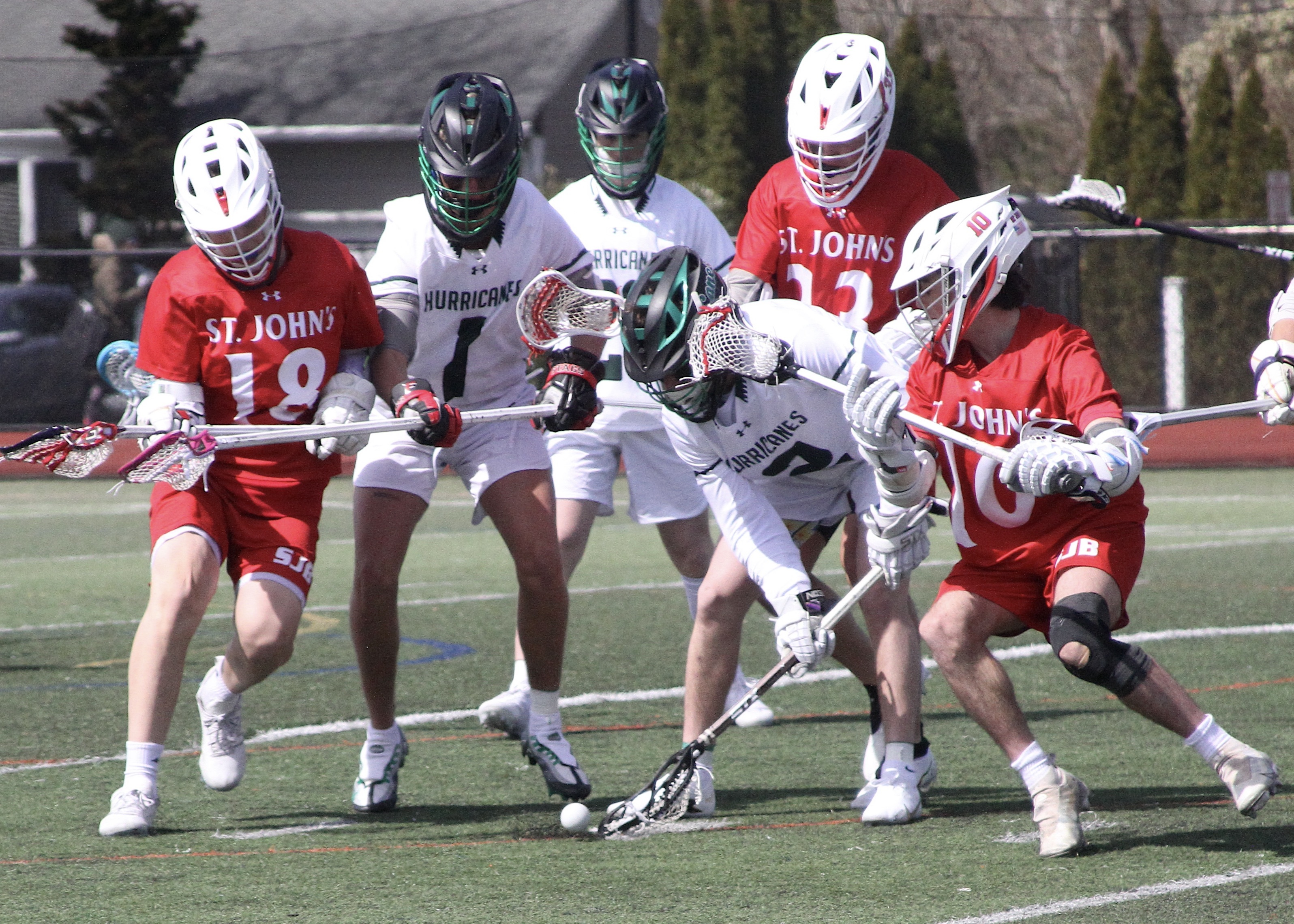 Junior midfielder Heath Sumwalt scoops up a ground ball. DESIRÉE KEEGAN