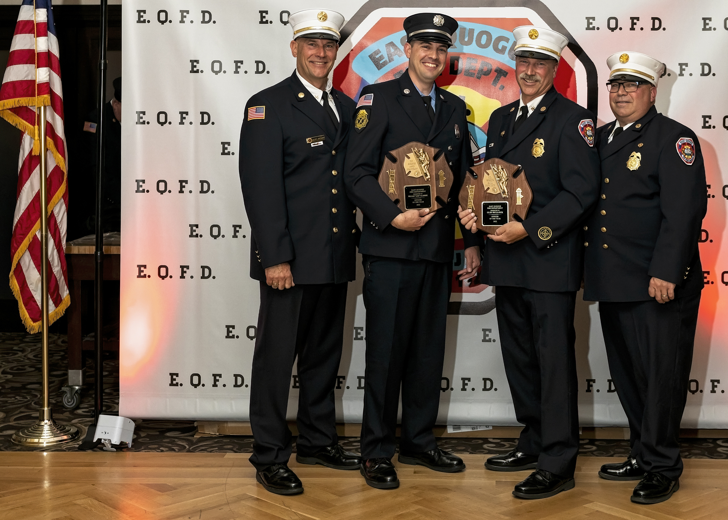 The East Quogue Fire Department held its annual installation dinner at the Long Island Aquarium in Riverhead on Saturday. The department honored Captain William “Alex” Gladding and Second Assistant Chief Glenn Bullock, second and third from left,  as Officers of the Year. With them are, from left, Third Assistant Chief Mark Gregory and Chief Paul Sulzinski. COURTESY EAST QUOGUE FIRE DEPARTMENT