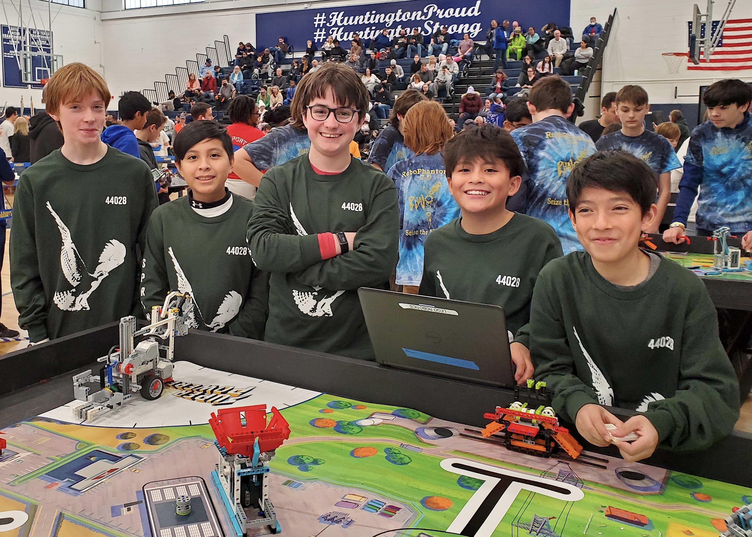 Springs School's Lightning Bots members Watts Comly, Danny Chuya, Adrie Quinn, Josue Llivicota and Max Oransky competed in the FIRST LEGO League Long Island qualifier at Huntington High School in February. Not pictured is team member Austin Allen. ERIK SCHWAB