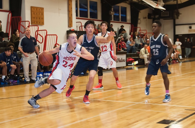 Andrew James heads for the the hoop against Stony Brook on Saturday.