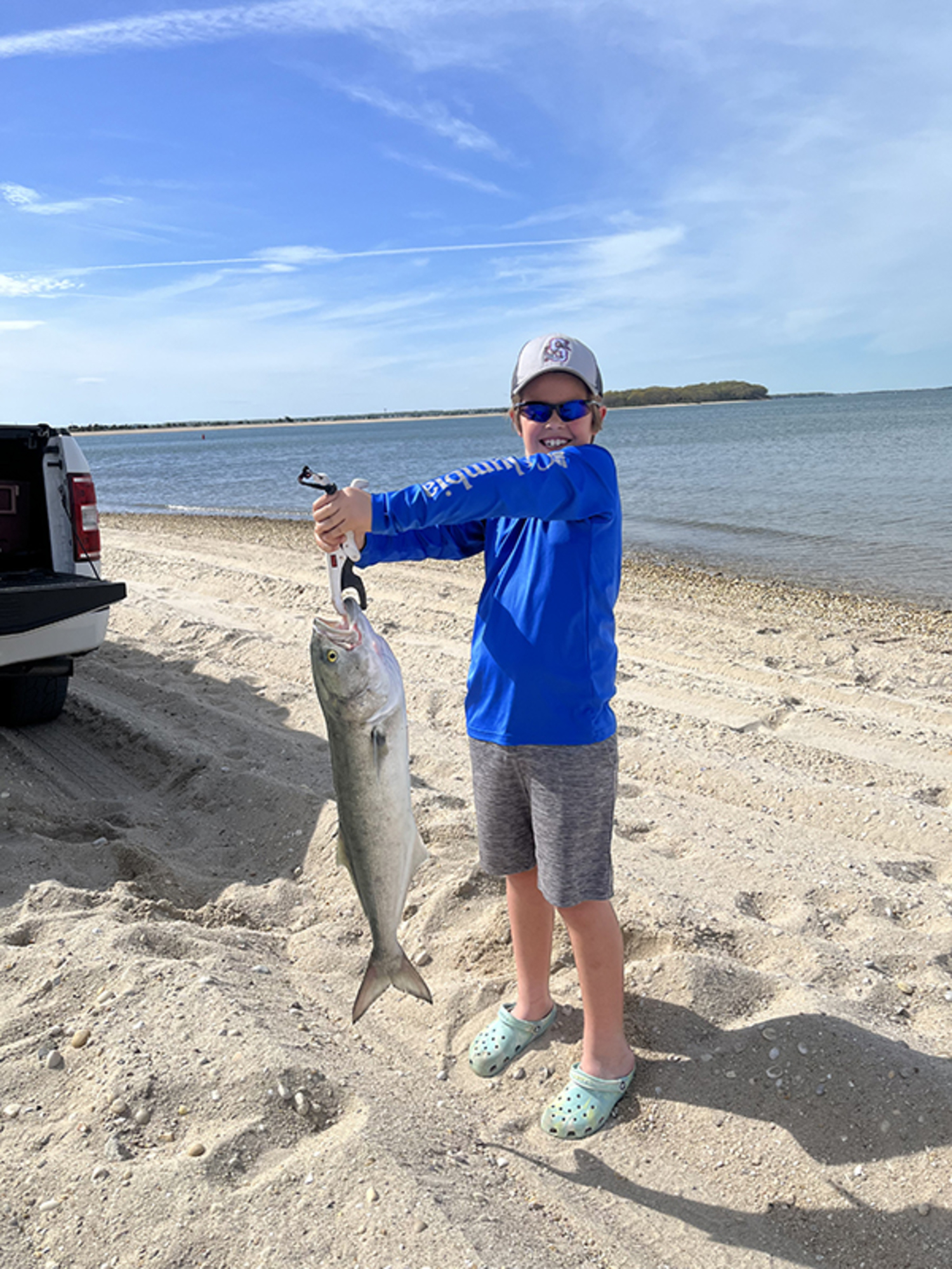 Thomas Capalbo hooked and beached this gorilla bluefish off the beach in Sag Harbor last week.