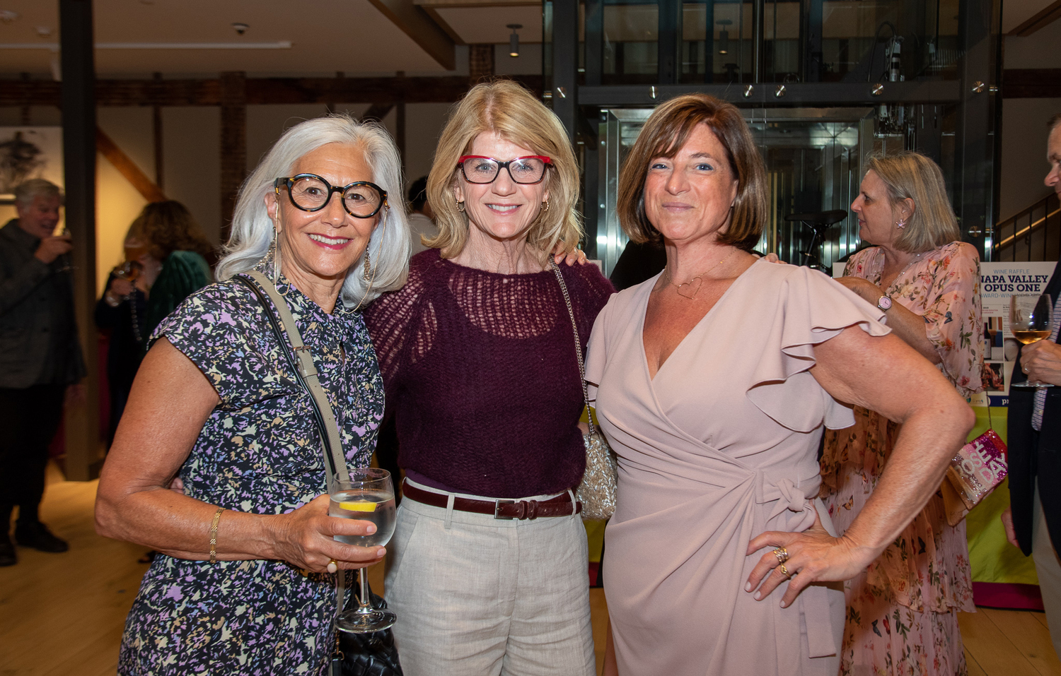 Judi Caron, Kathleen King and Theresa at the i-tri Spring Cocktail Party and Auction at The Church in Sag Harbor on Saturday.  LISA TAMBURINI