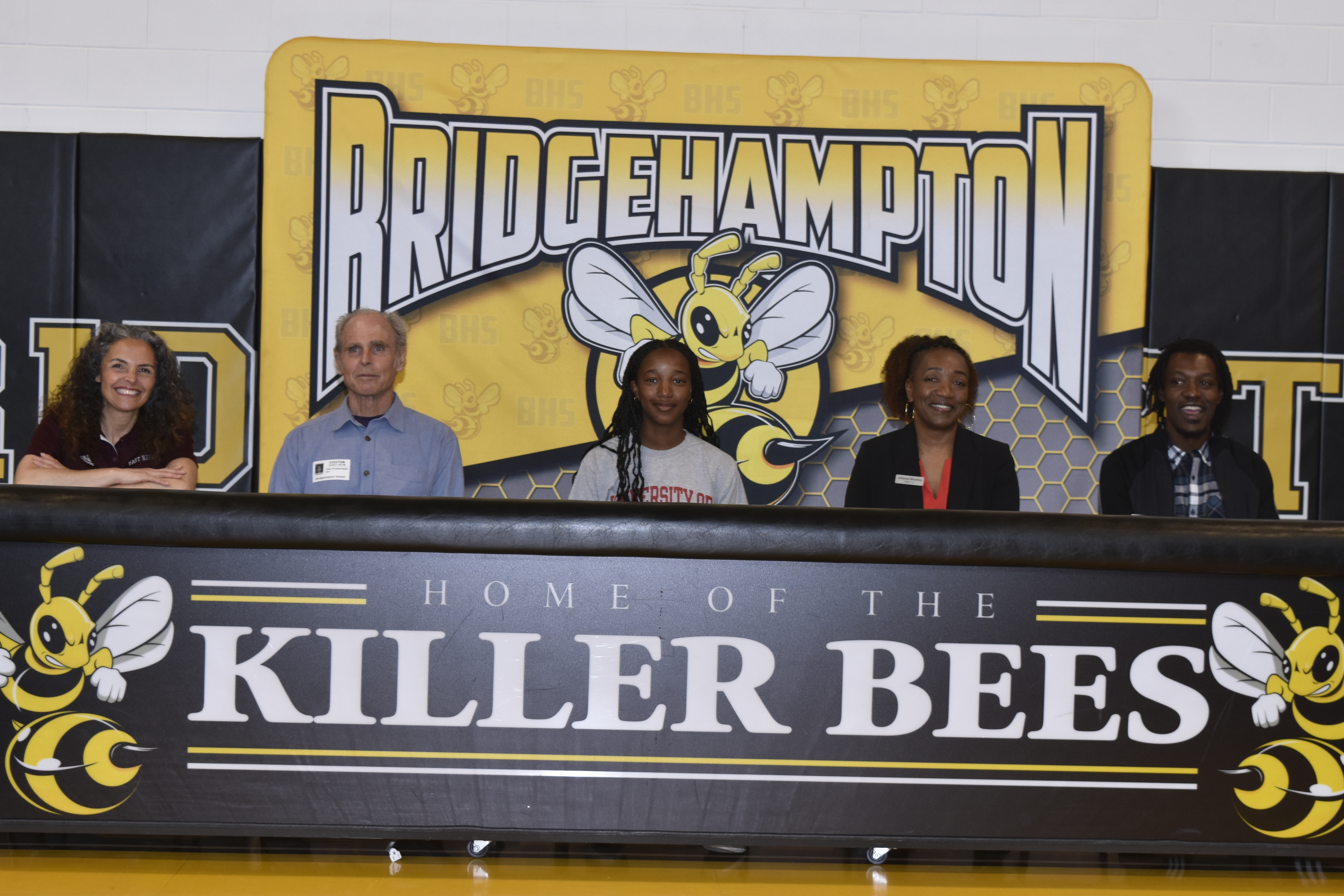 Leslie Samuel had a number of supporters at her college announcement in Bridgehampton on April 26. From left, East Hampton girls track head coach Yani Cuesta, her father John Pomianowski, Leslie, her mother Julianna Moseley and brother Tevin Campbell.   DREW BUDD