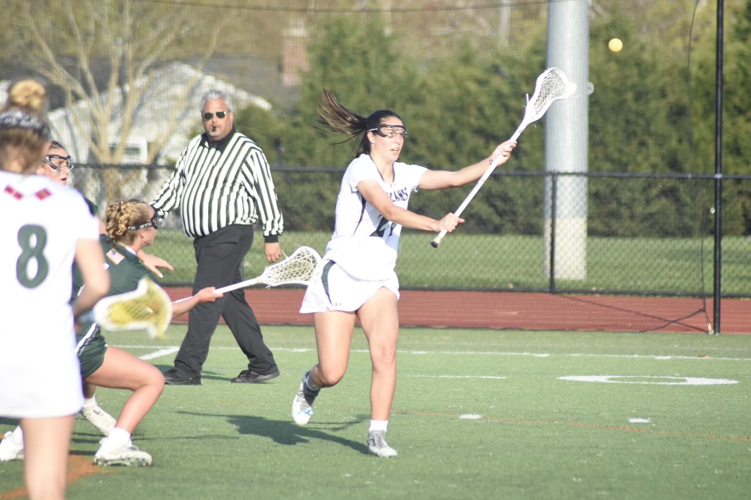 Senior midfielder and defender Reilly Mahon moves the ball around on offense. DREW BUDD