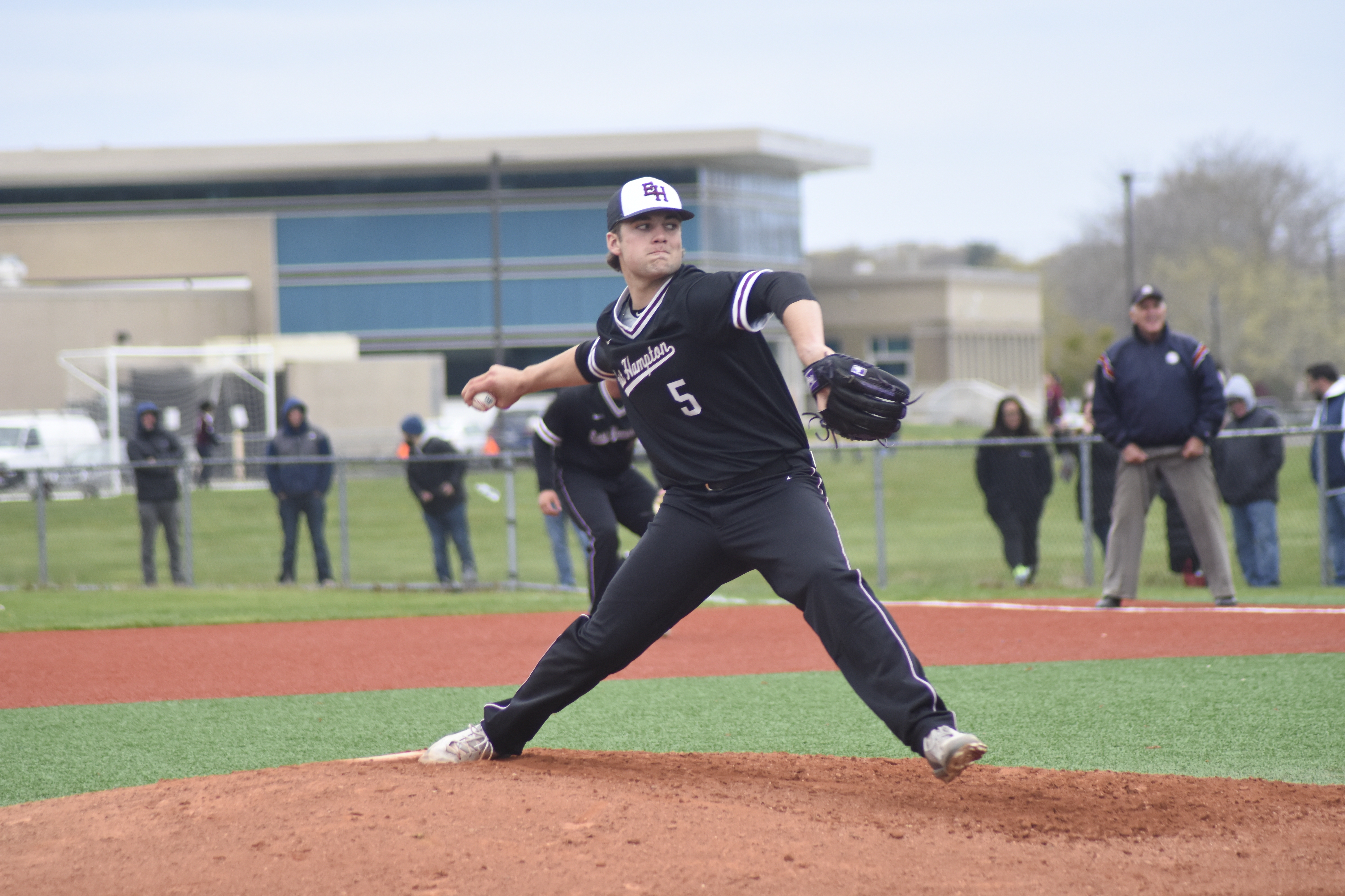 Senior starting pitcher Jack Dickinson pitched in and out of trouble on Friday, ultimately getting the victory after the Bonackers' late rally resulted in a 9-1 win.    DREW BUDD