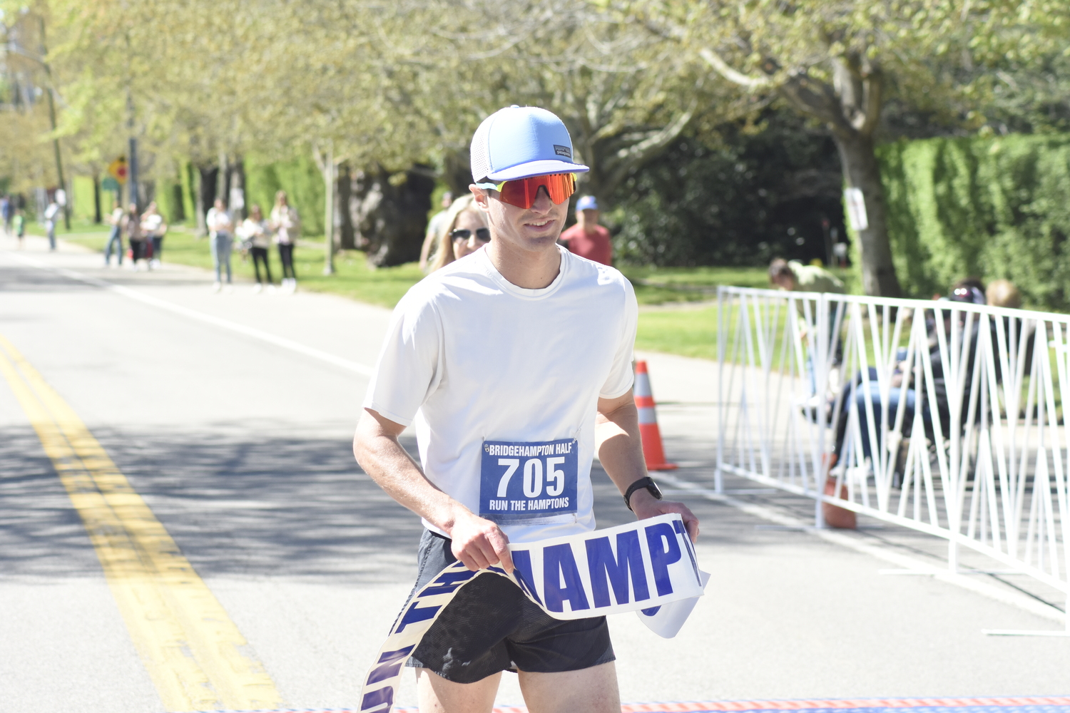 Ben Tuttle of East Moriches won the eighth annual Bridgehampton Half Marathon on Saturday.    DREW BUDD