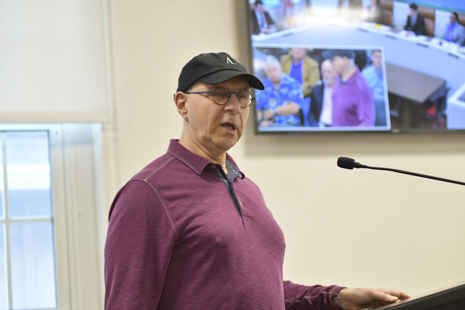 Diamon Court resident Russ Pearlstone speaks against the location of the sewage treatment plant at the May 11 meeting.  DANA SHAW