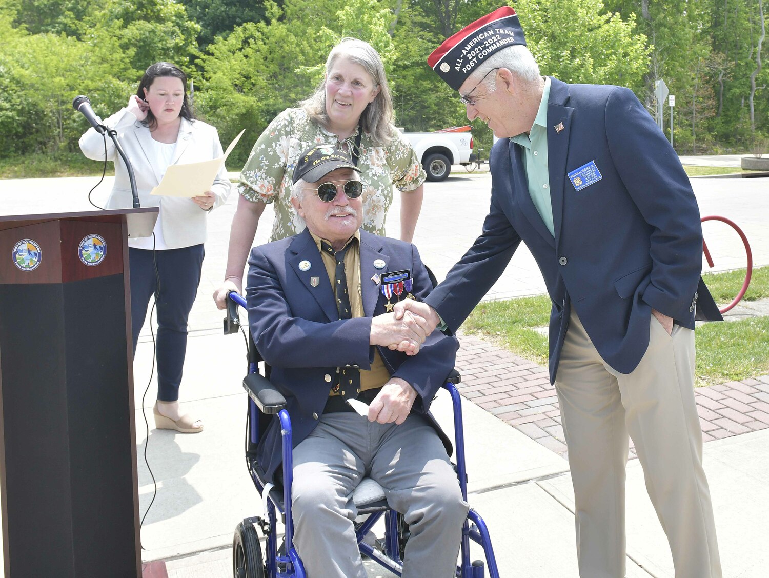 Veterans Ron Campsey and William M. Hughes Jr. in Good Ground Park on Monday.  DANA SHAW