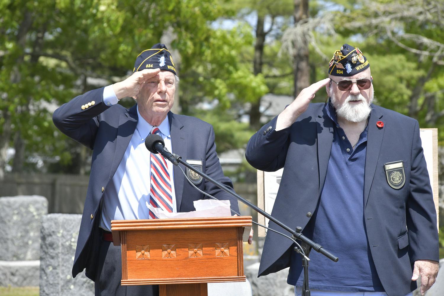 Thomas Hadlock and Paul Haines during Memorial Day services at Westhampton Cemetery on Monday.
