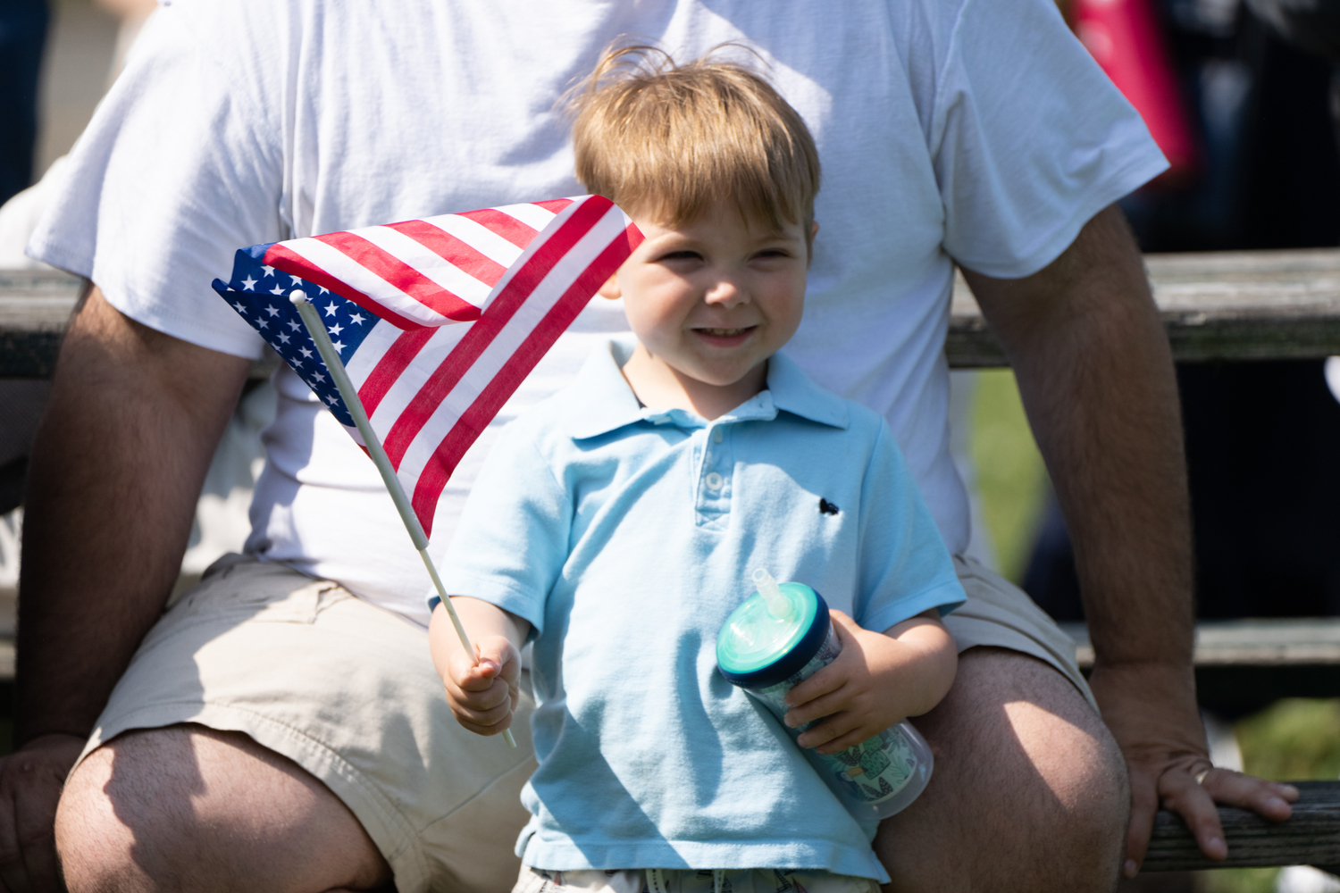 A young boy watches the parade pass. LORI HAWKINS