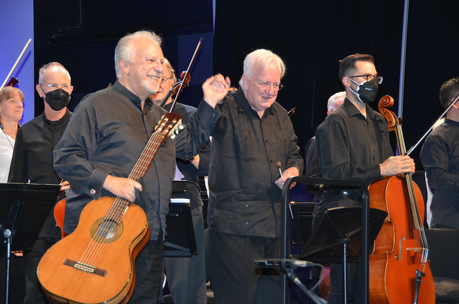 Classical guitarist Pepe Romero and Maestro Michael Palmer take a bow during a TH·FM concert at LTV Studios in September 2022. BARRY GORDIN