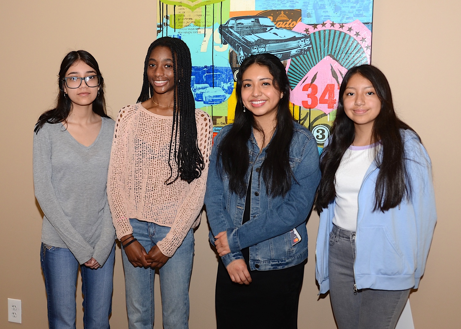 East Hampton High School students, from left, Jamie Villa, Zion Osei, Rihanna Pinos, Emily Bermeo, were recently named Next Level Playing Field Foundation scholars. KYRIL BROMLEY