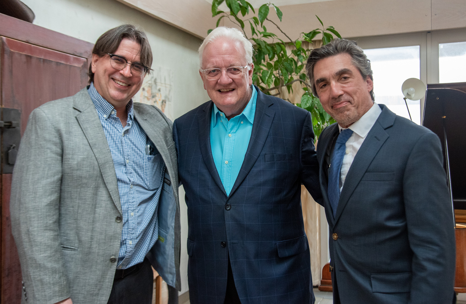 From left, pianist Brandt Fredrickson, Maestro Michael Palmer, TH·FM's artistic director,  and violinist Nick Danelson at 