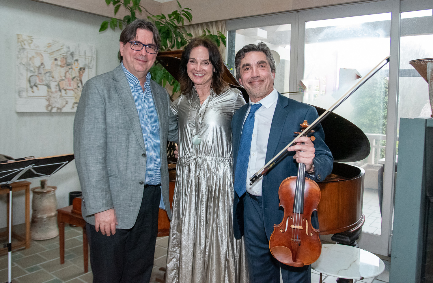 From left, pianist Brandt Fredrickson, LongHouse Reserve Director Carrie Rebora Barratt and violinist Nick Danelson at 