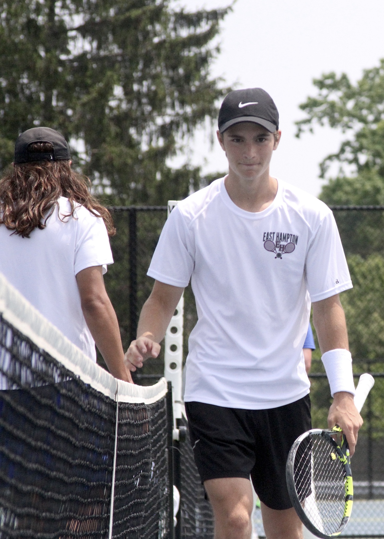 East Hampton senior Max Astilean is all smiles after shaking hands with his Comsewogue opponent following his Suffolk County quarterfinals win. DESIRÉE KEEGAN