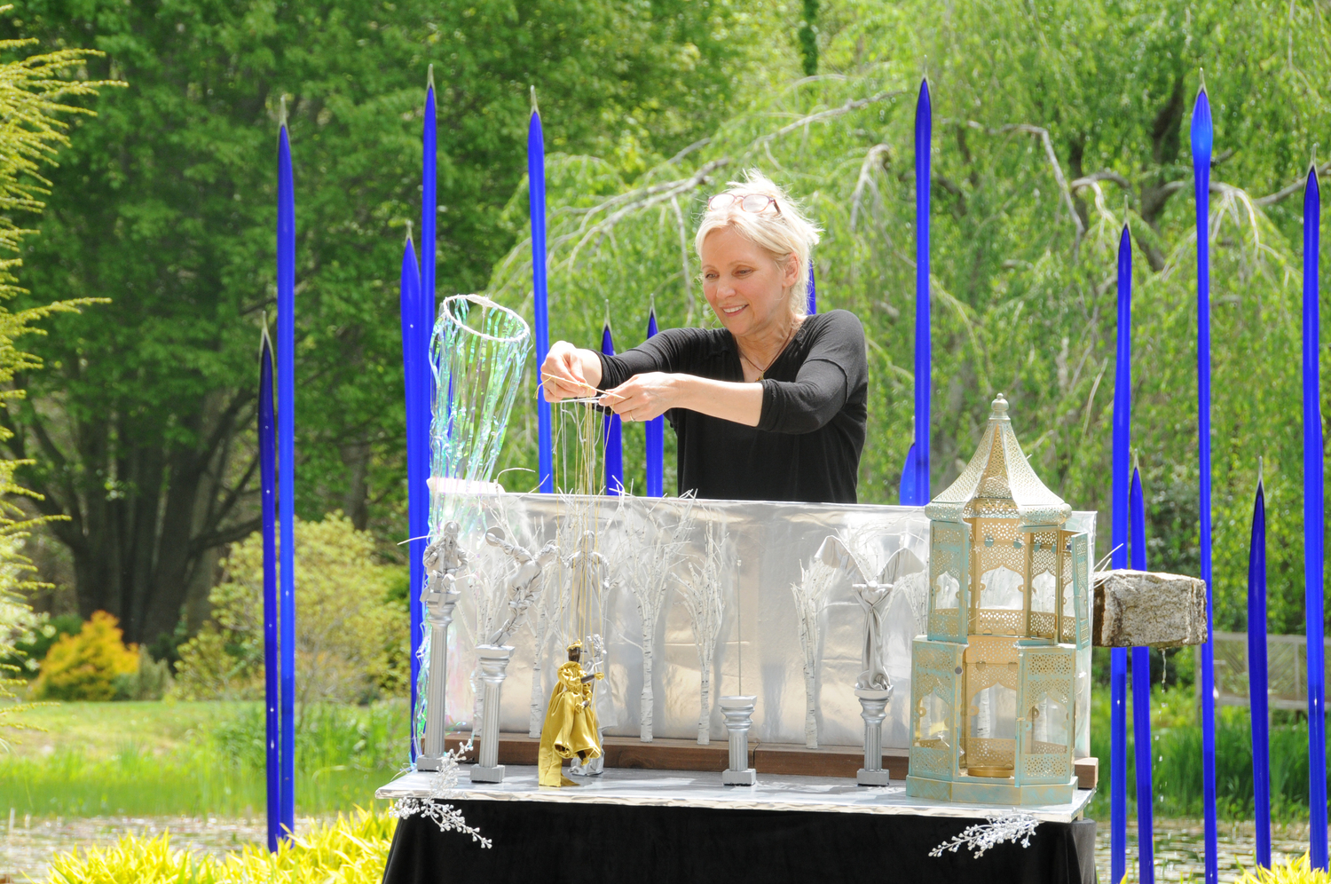 Kim Profaci of the The Marionette Company put on a marionette performance and helped attendees choose supplies to make their own at LongHouse Reserve in East Hampton on Saturday.  RICHARD LEWIN