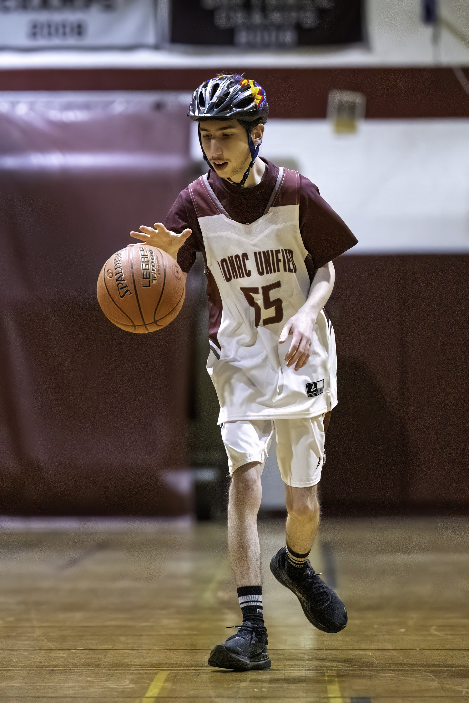 Bonacker Liam Baum dribbles the ball down the court.   MARIANNE BARNETT