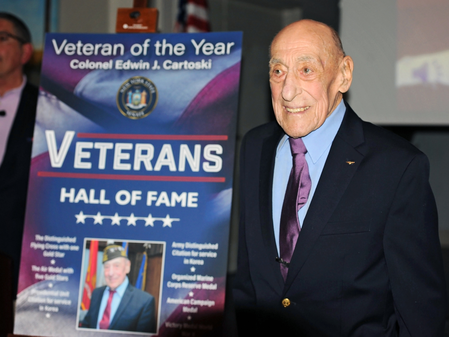 Edwin Cartoski, a World War II veteran and Korean War Marine aviator, was named Veteran of the Year for the First Senatorial District by Senator Anthony Palumbo. COURTESY PECONIC LANDING